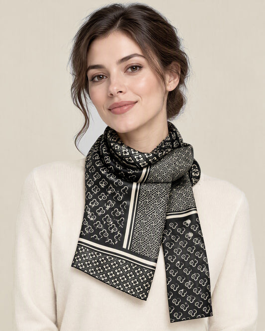 Woman wearing Ink Gold Elegance slim mulberry silk scarf