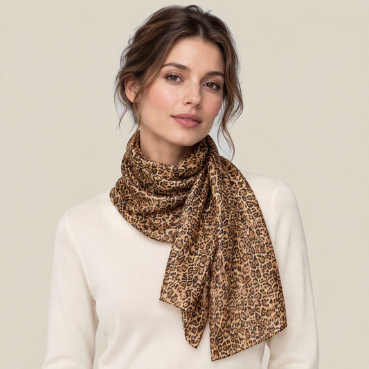 Woman wearing Yellow brown leopard print mulberry silk scarf, 69 x 43 in
