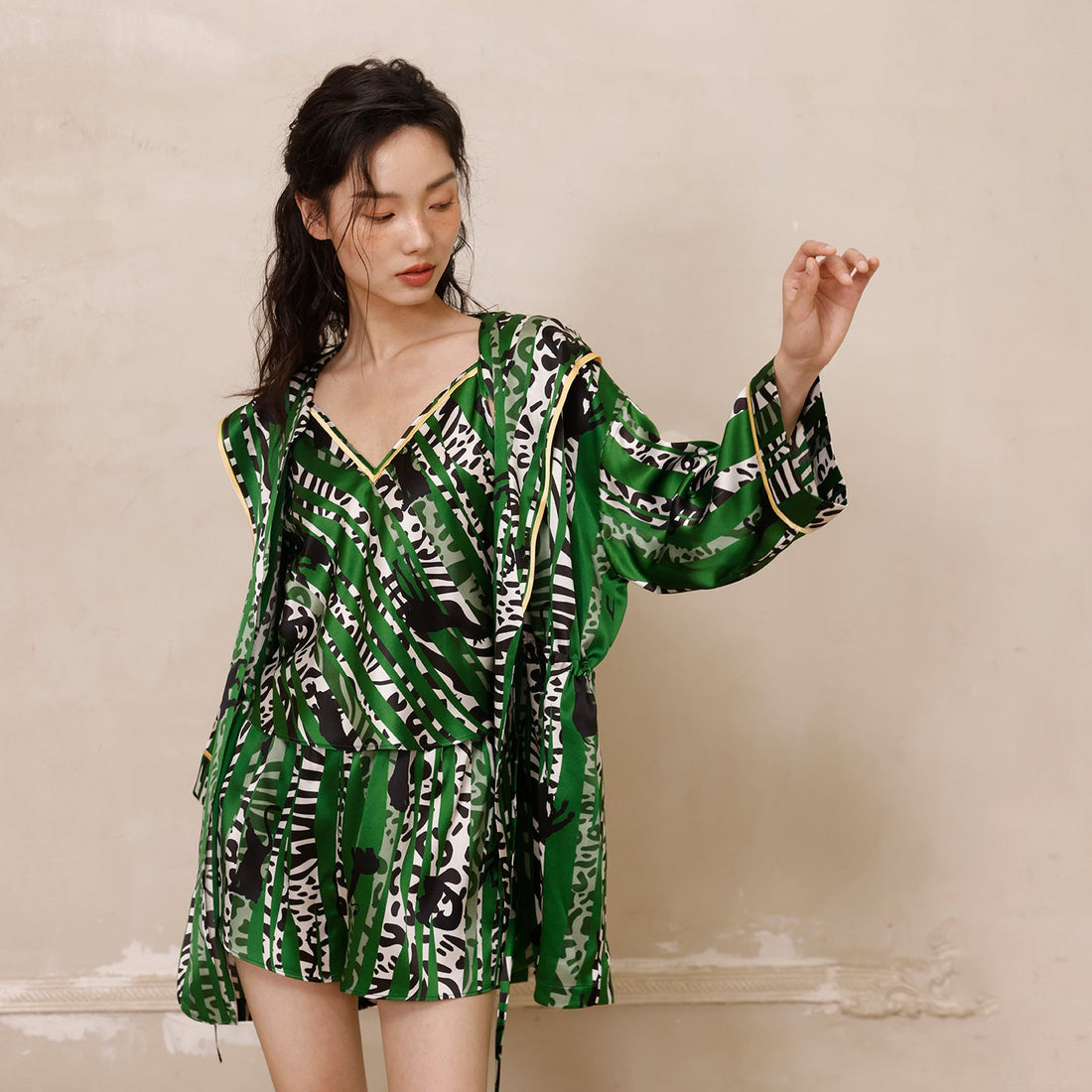 Short mulberry silk robe laid flat, illustrating how to care for silk