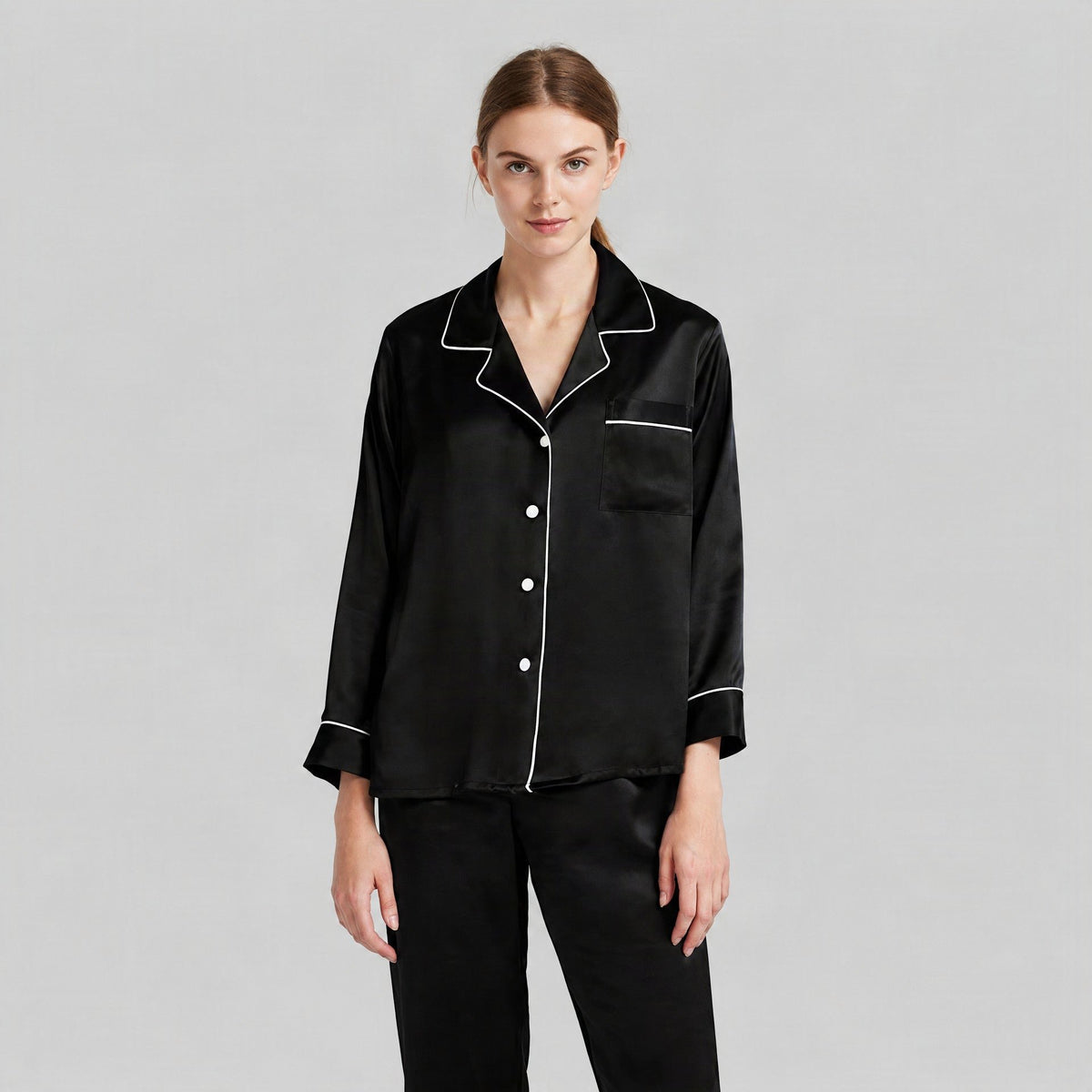 Black mulberry silk pajama set with notch lapel on white background