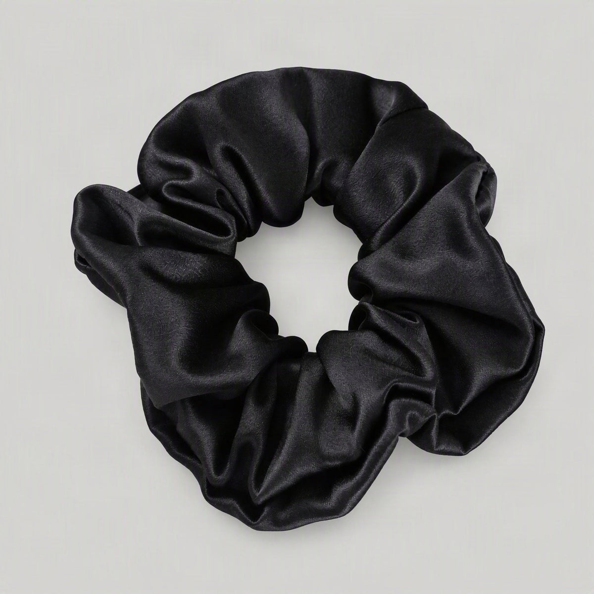 Close-up of SuuSilk 30 Momme Mulberry Silk Scrunchie highlighting its soft, lustrous silk texture