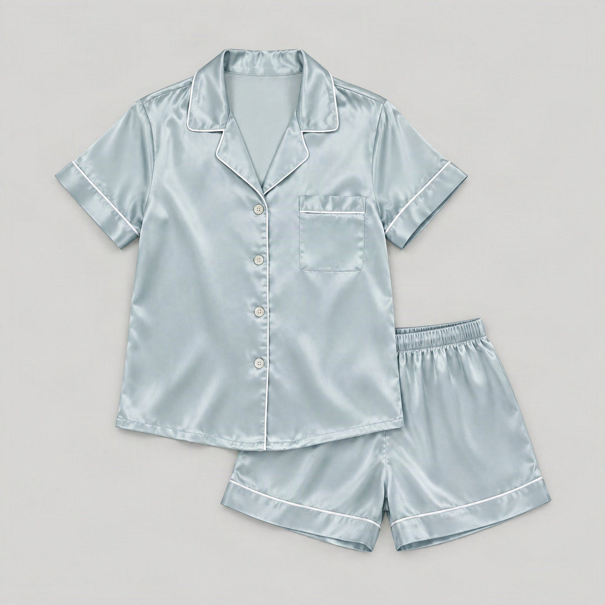 Mulberry silk pajama set laid flat, full garment view