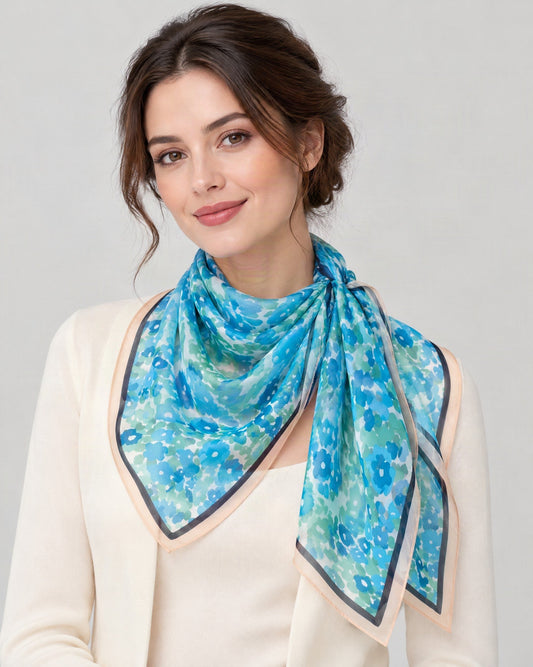 Blue Cartoon Floral Mulberry Silk Long Scarf – 16.5 x 63 in, worn tied at the neck over a cream top