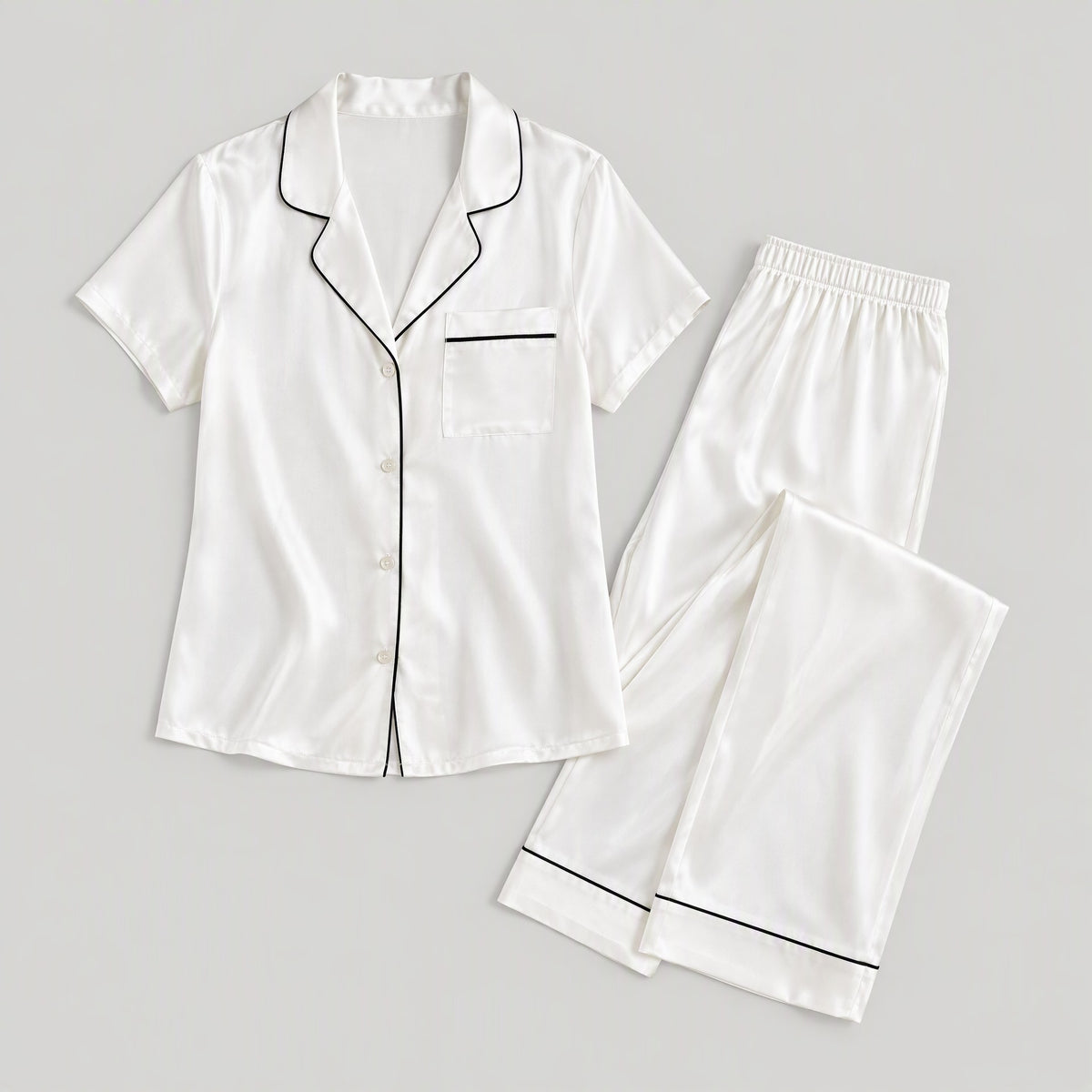 Mulberry silk pajama set laid flat, full garment view