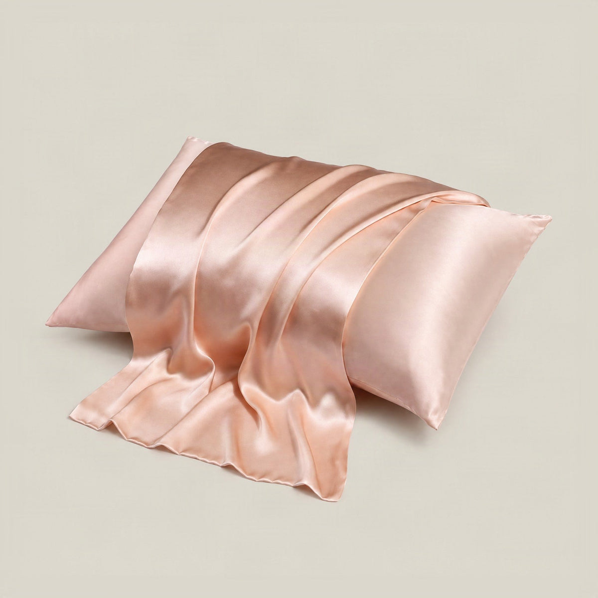 Cream-colored 16 Momme double-sided mulberry silk pillowcase with hidden zipper, neatly styled on a bed