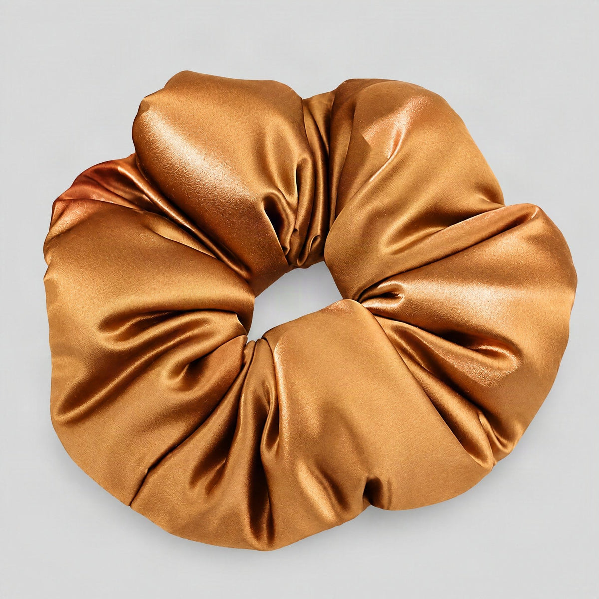 SuuSilk 30 Momme padded mulberry silk scrunchie in soft neutral tone, gentle on hair for everyday wear