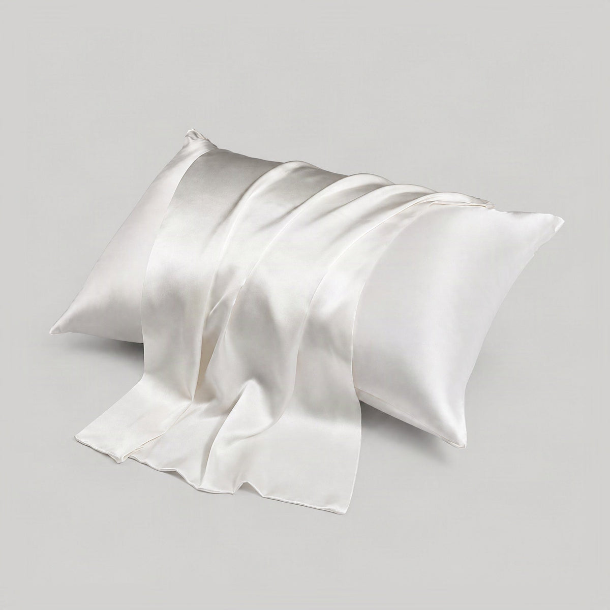 SuuSilk 16 momme mulberry silk envelope pillowcase in multicolour, displayed closed with hidden closure on neutral bedding