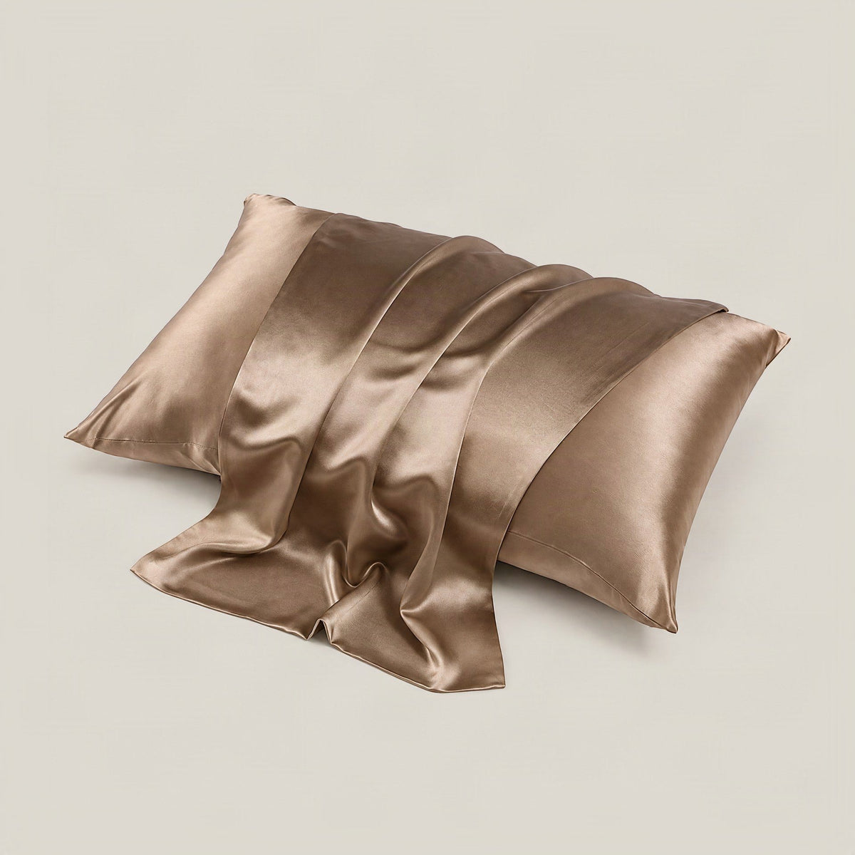 Ivory matte 22 momme mulberry silk pillowcase with hidden zipper on a soft linen bed setting