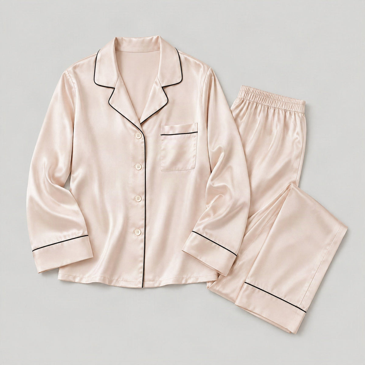 Mulberry silk pajama set laid flat, full garment view