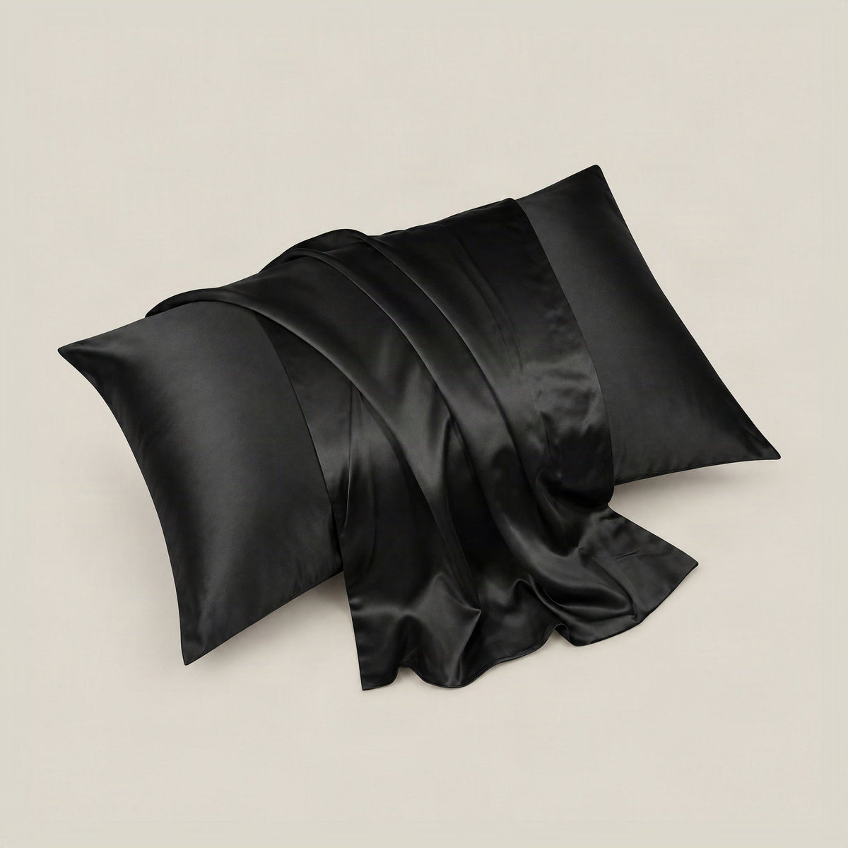 SuuSilk 30 Momme mulberry silk pillowcase in soft pastel color draped on a styled bed with hidden zipper detail visible