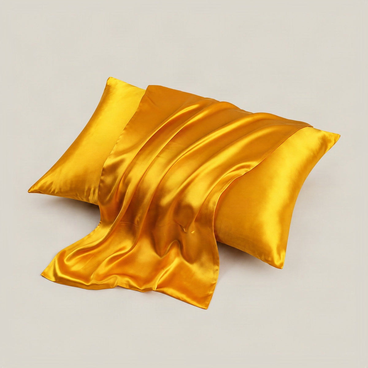 19 Momme Mulberry silk pillowcase with hidden zipper resting on a neutral-toned bed in soft natural light