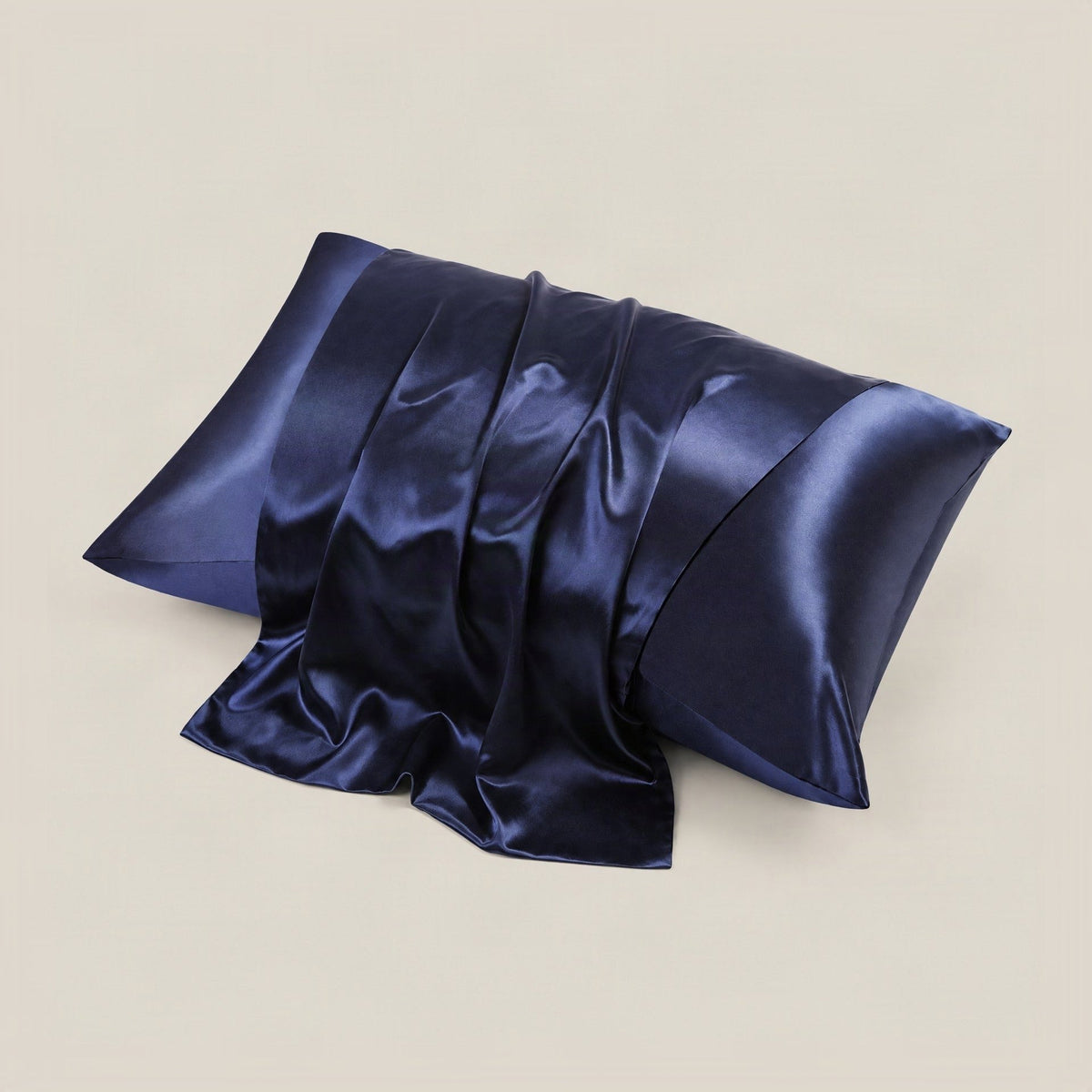 White SuuSilk 22 Momme glossy mulberry silk envelope pillowcase with hidden closure on a styled bed setting