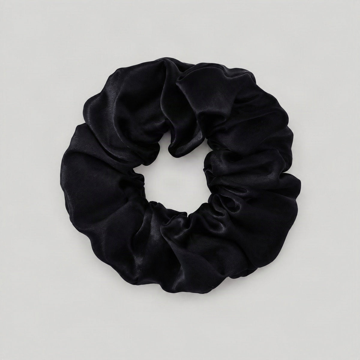 SuuSilk mulberry silk scrunchie in soft pastel hue, gentle on hair for everyday wear
