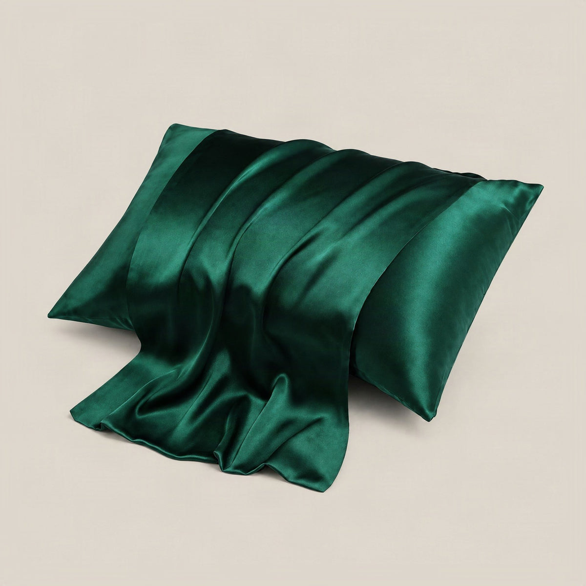 SuuSilk 16 Momme mulberry silk pillowcase in soft cream with hidden zipper, styled on a crisp bed with natural light