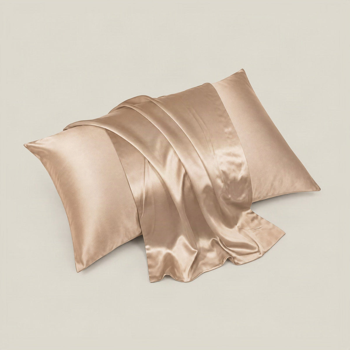 SuuSilk 30 Momme mulberry silk pillowcase in soft pink, shown with hidden zipper detail on a cozy bed setting