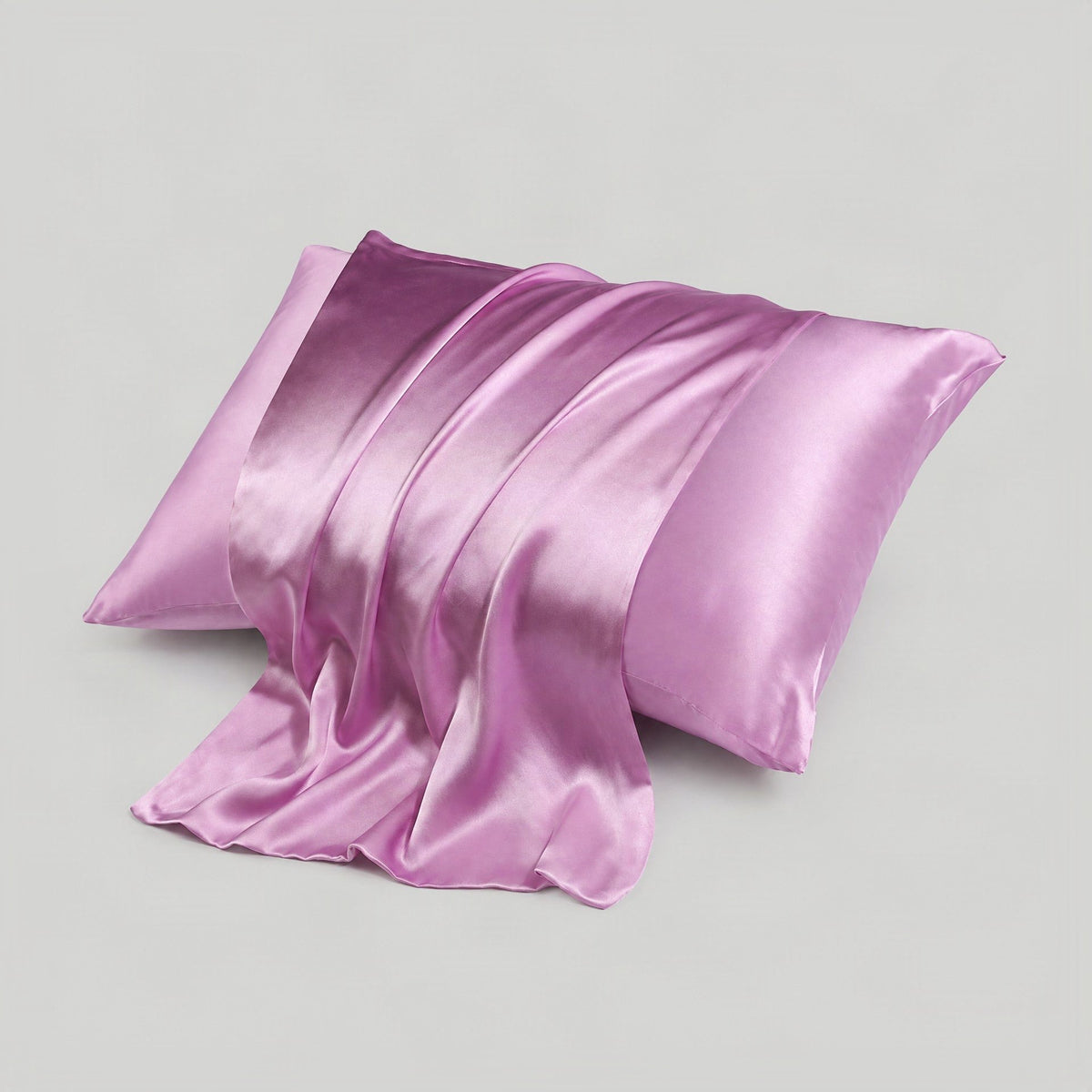 SuuSilk 16 Momme mulberry silk envelope pillowcase in champagne color with hidden closure detail on neutral bedding