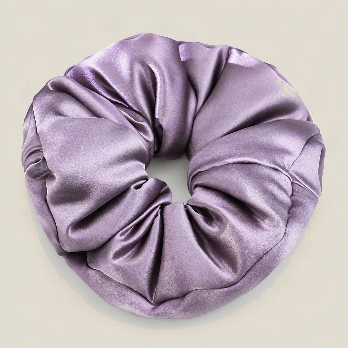 SuuSilk 30 Momme padded mulberry silk scrunchie in soft neutral tone, gentle hair accessory for everyday wear