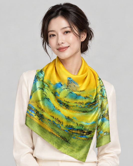 Layered Green Hills Mulberry Silk Long Scarf – 22 x 68 in, worn tied at the neck over a cream top