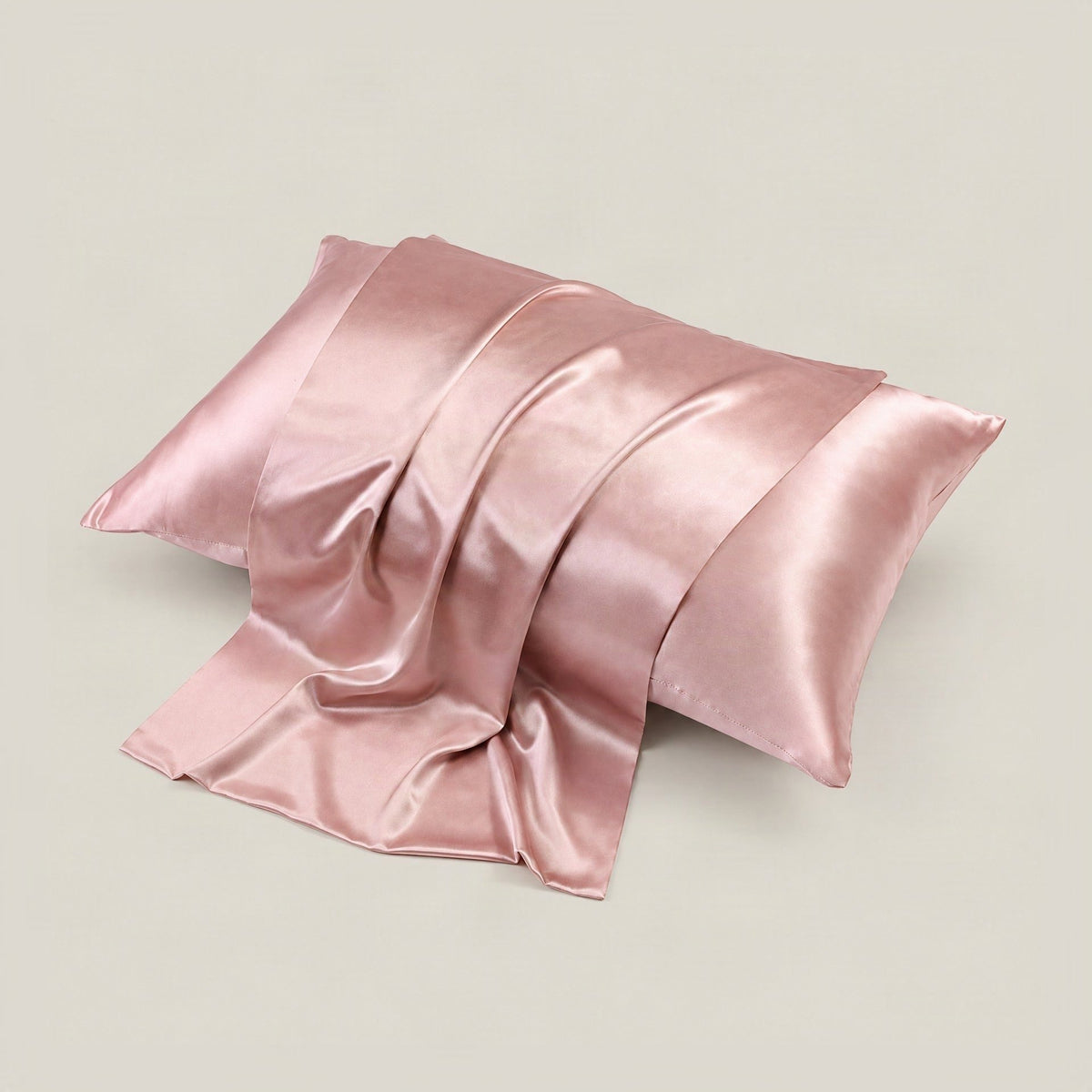 SuuSilk 22 Momme glossy mulberry silk envelope pillowcase in soft pastel colors, hidden closure detail shown on white bedding