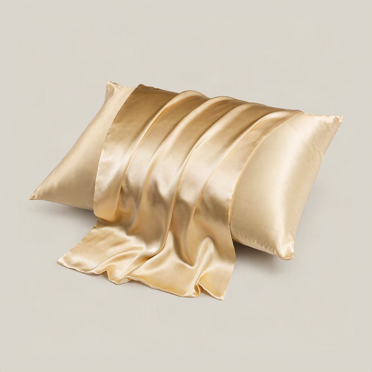 SuuSilk 16 Momme mulberry silk pillowcase with hidden zipper, shown in soft natural lighting on a styled bed