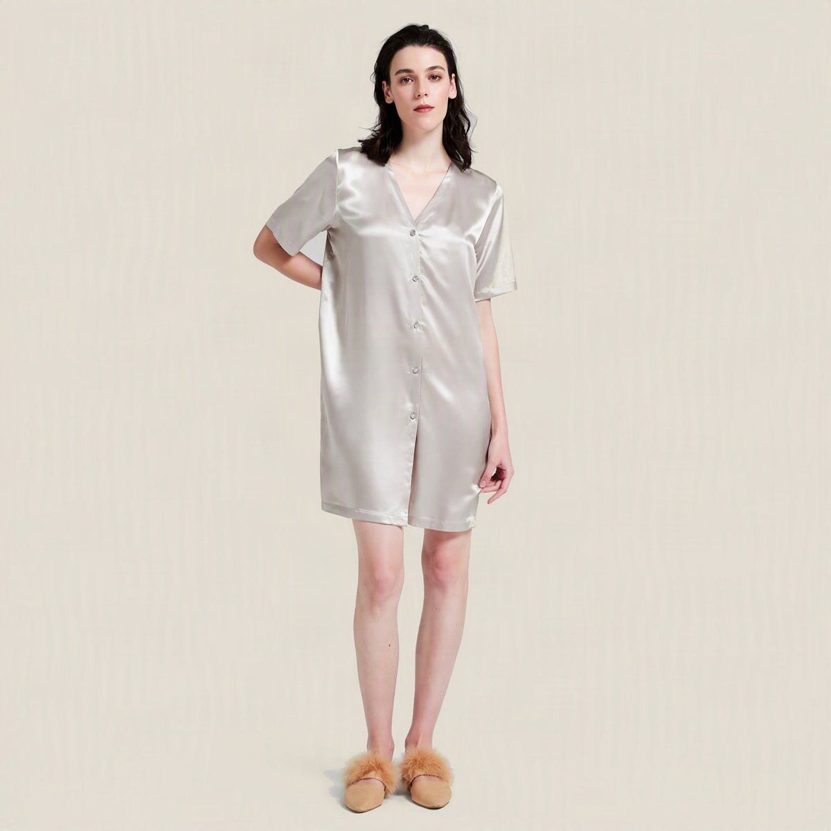 Pale silver 19 momme mulberry silk button-front nightgown with a V neck and short sleeves, worn by a model