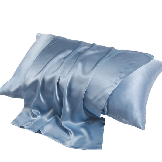 Light pink silk pillowcase laid flat to show color and finish