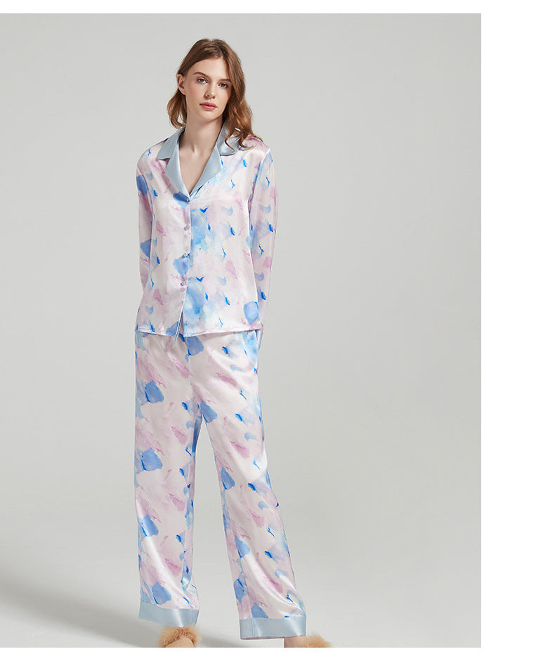 Collar and button detail on the silk pajama shirt
