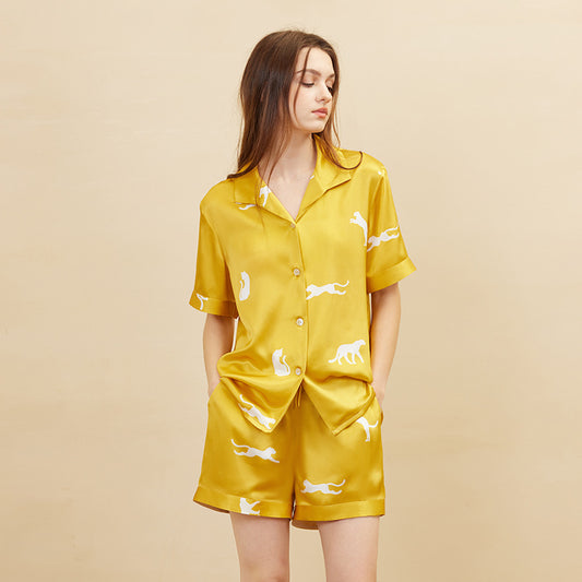 Gold leopard print silk pajama set front view on white background