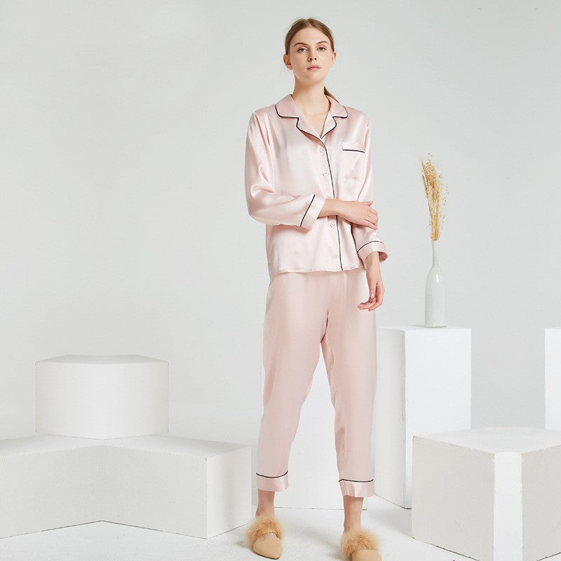 Full front view of pink silk pajama set with piping details and matching pants
