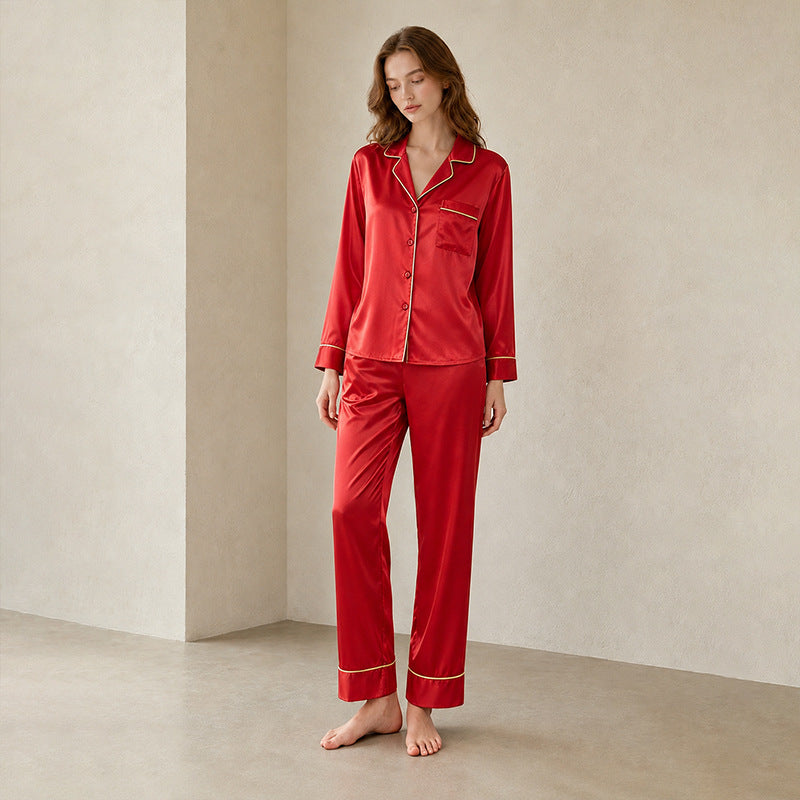 Red silk pajama set with gold trim detail