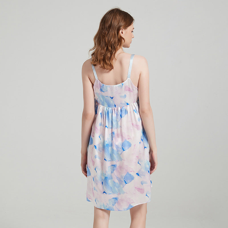 Side profile of silk cami dress highlighting its flowing silhouette