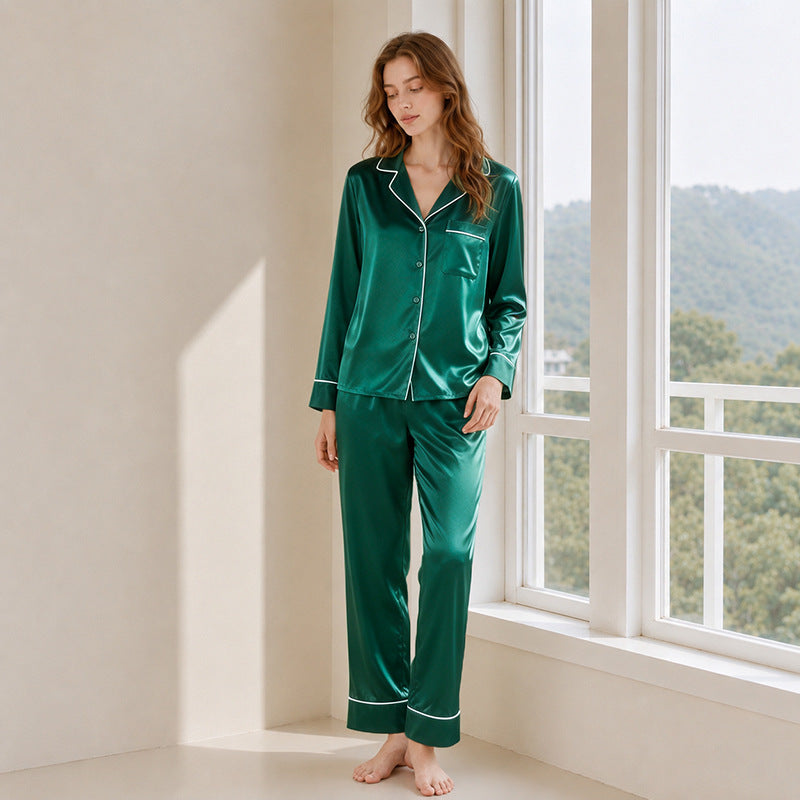 Dark green silk pajama set styled in natural light