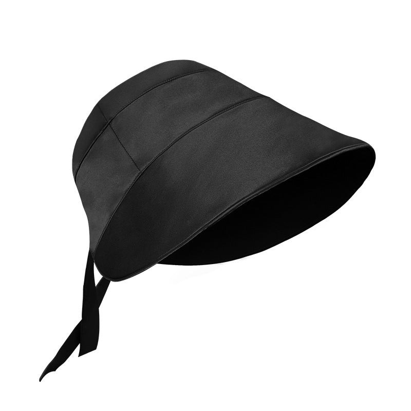 Black silk wide-brim hat on white background