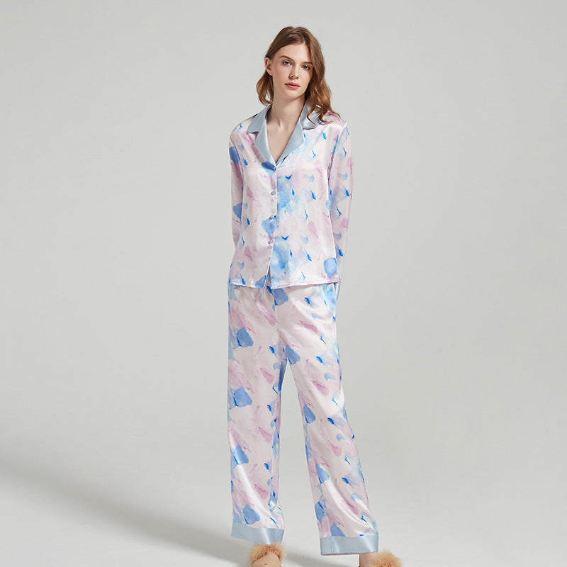 Back view of the silk pajama shirt showing the notched collar and relaxed fit