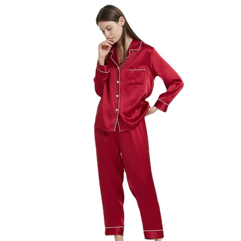 Side view of wine red silk pajama set showing relaxed fit