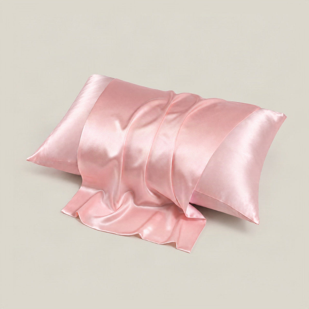 White 22 Momme Mulberry silk pillowcase with hidden zipper, neatly arranged on a soft bed in a bright, airy bedroom.