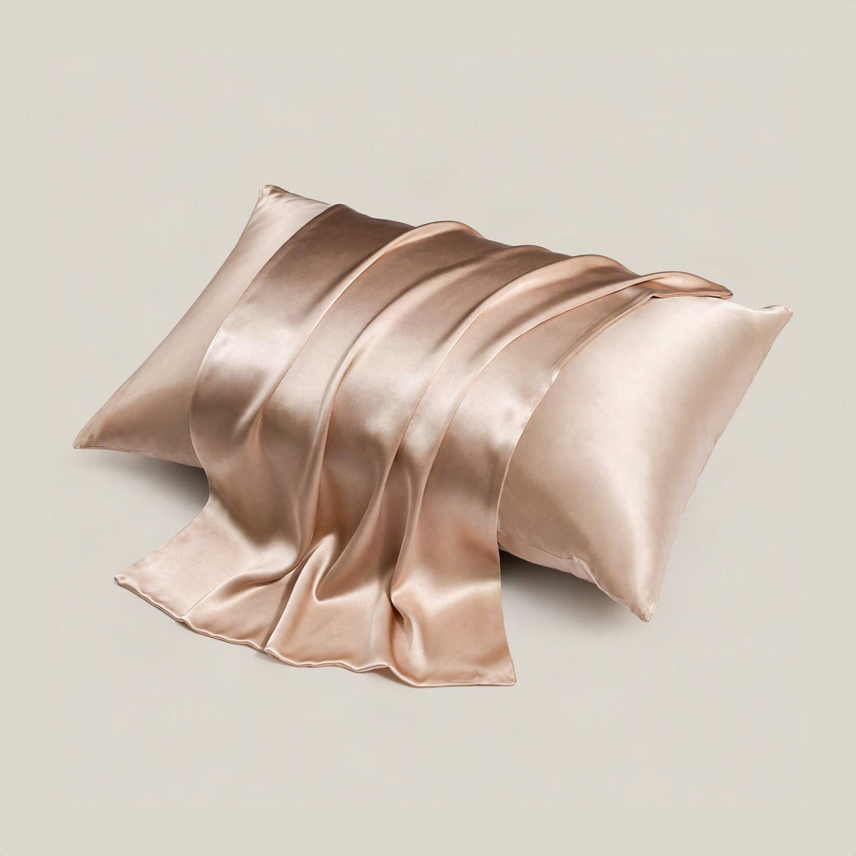 White SuuSilk 16 momme mulberry silk pillowcase with hidden zipper styled on a styled bed with neutral tones.