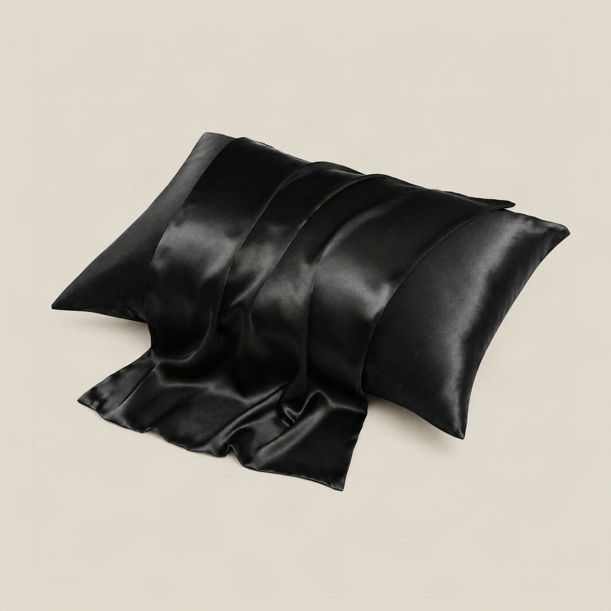 White 16 Momme mulberry silk pillowcase with hidden zipper styled on a neutral linen bed setting