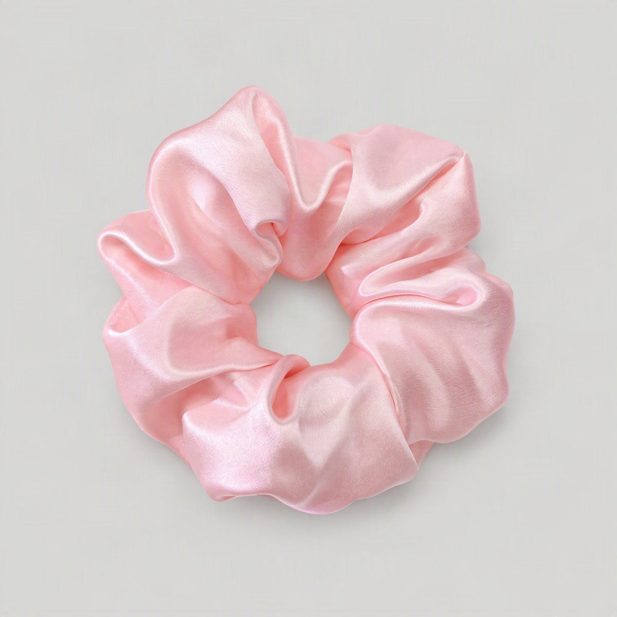 SuuSilk mulberry silk scrunchie in soft pastel hue, gentle on hair for everyday wear