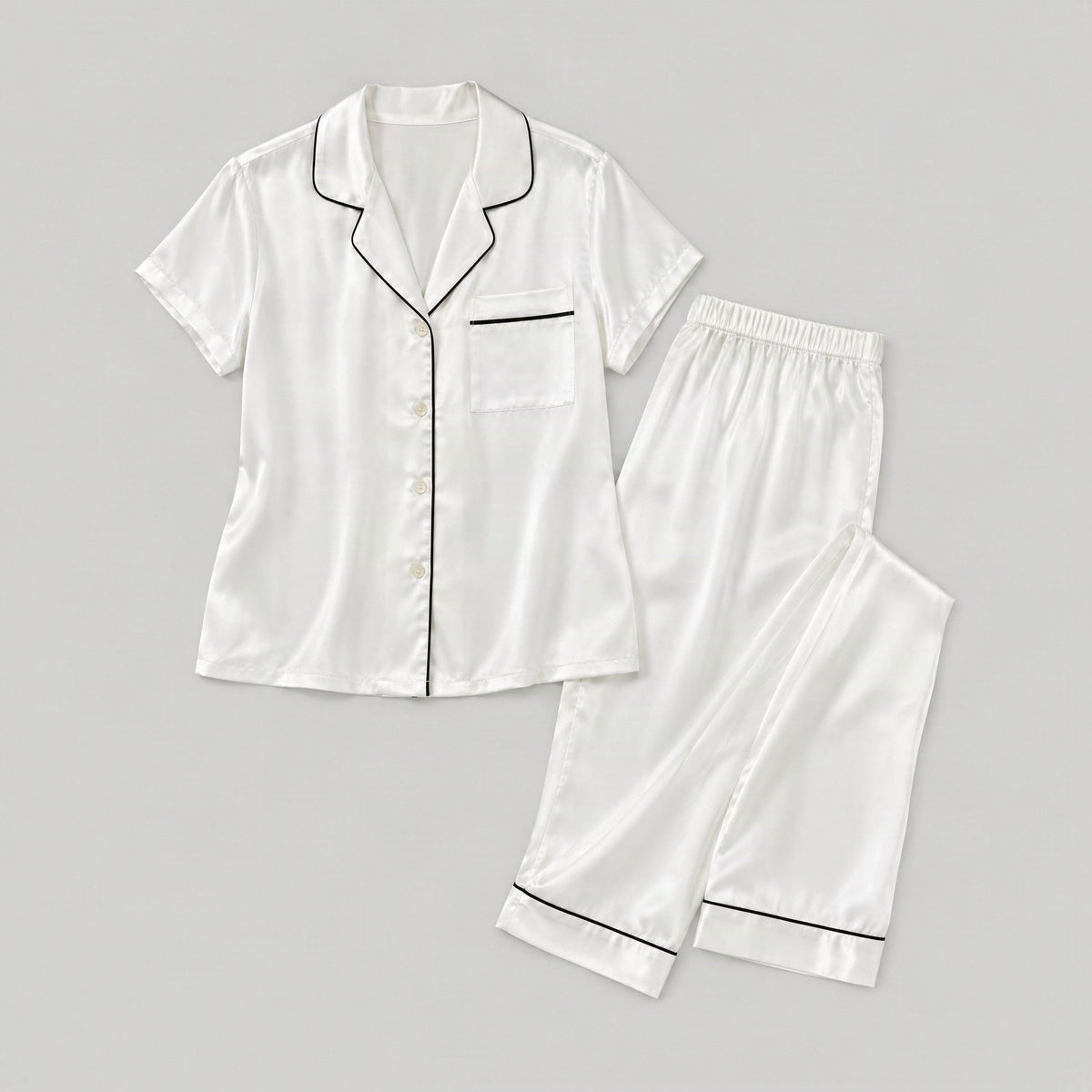 Mulberry silk pajama set laid flat, full garment view